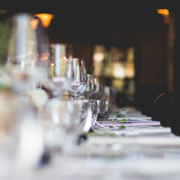 glasses of wine in a row on a table