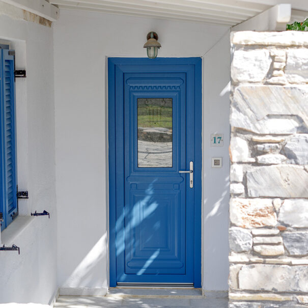 blue door on white walls